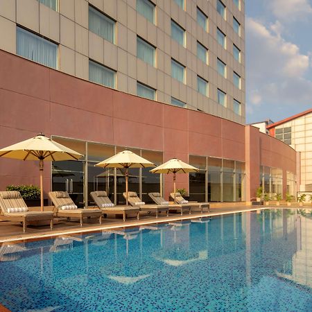Radisson Gurugram Udyog Vihar Hotel Gurgaon Exterior photo The pool at the hotel