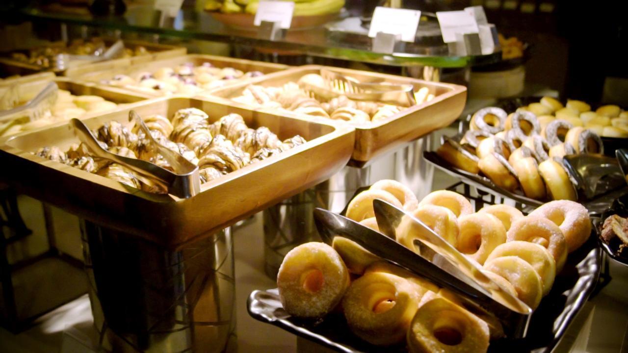 Radisson Gurugram Udyog Vihar Hotel Gurgaon Exterior photo A selection of pastries